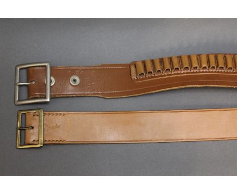A Brady leather belt, size medium together with a Smith &amp; Wesson ammunition belt .22 rim fire or similar size calibre, si