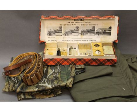 German Army coat, pair of camouflage waterproof trouser, vintage part Parker Hale cleaning kit and cartridge belt. 