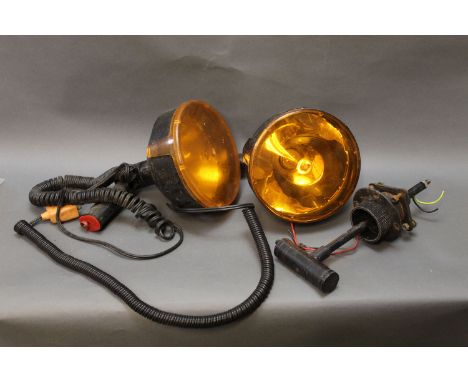 Two lamps with orange filters, and a roof mounting bracket.