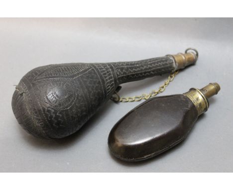 A Camel scrotum style shot flask, together with an early leather bodied shot flask.