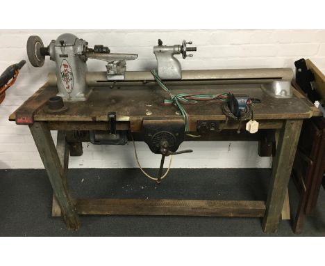 A Myford lathe on scratch built bench with Arkinson's vice 