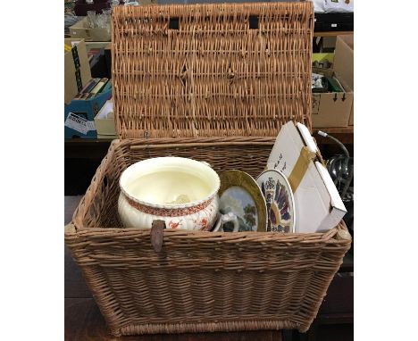 A wicker hamper together with two chamber pots, Henry Alcock, with a decorative plate depicting a landscape, and a Nexus 'The
