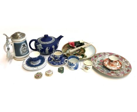 A mixed lot of ceramics and other items to include a dark blue Wedgwood Jasperware teapot, several coffee cans and saucers, t