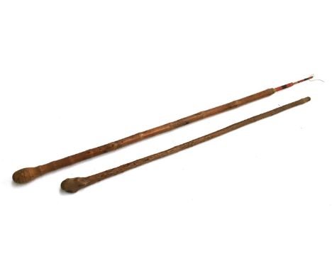 A Japanese bamboo telescopic fishing rod, carved with figures and fish; together with a walking stick 