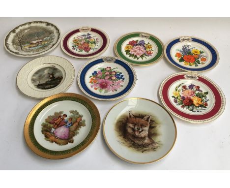 A collection of nine decorative ceramic plates, to include Limoges and Bohemia 