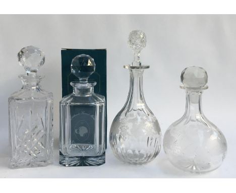 A Bohemia crystal decanter, inscribed 'Oaklands Hound Show 2009'; together with one other similar and two engraved decanters 