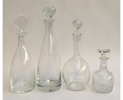 Three good glass decanters; together with a cut glass decanter suitable for Schnapps 
