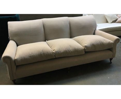 A good quality three seater sofa, upholstered in a grey fabric, approx. 215cmW 