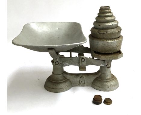 A set of vintage scales with weights 