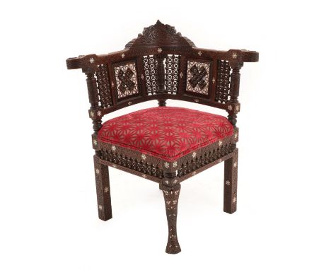 A Syrian Bone and Mother-of-Pearl Inlaid Hardwood Corner Chair, late 19th/early 20th century, with ogee cresting over turned 