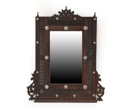 A Damascus Mother-of-Pearl and Bone Inlaid Hardwood Overmantel Mirror, late 19th century, with scroll cresting over a rectang