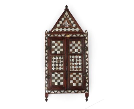 A Damascus Tortoiseshell, Horn and Mother-of-Pearl Inlaid Toilet Mirror, circa 1900, the triangular pediment with a Tughra ov