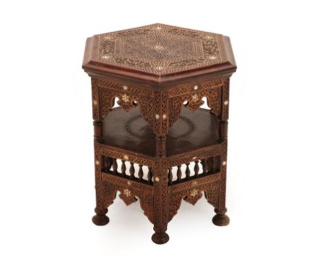 A Damascus Mother-of-Pearl Inlaid Hardwood Occasional Table, late 19th/early 20th century, the hexagonal top carved with call