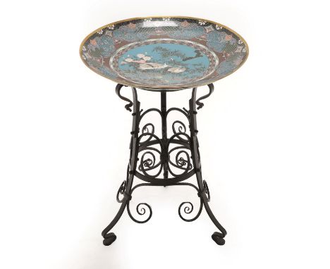 A Japanese Cloisonné Enamel Dish, Meiji period, decorated with cranes in a circular panel on a brocade ground, 45cm diameter,