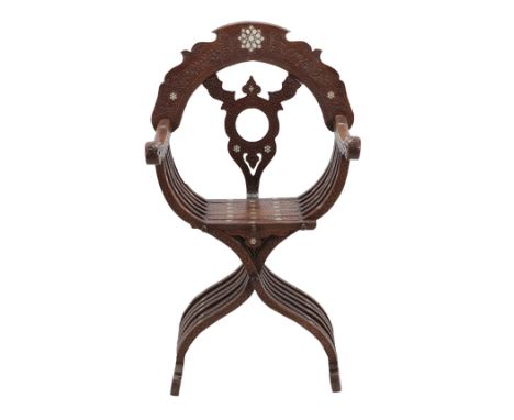 A Damascus Mother-of-Pearl Inlaid Savonarola Armchair, late 19th century, the cresting with calligraphic panels over a tricor