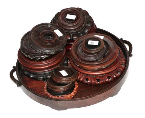 A Chinese Hongmu Tray, late Qing Dynasty, of circular form with loop handles an cloud scroll feet, 51cm wide; and A Collectio