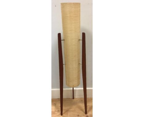 A 1960's rocket floor lamp, with triform teak legs and spun fibreglass tubular light shade 113cm (44in)  