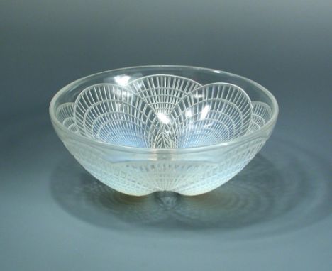 Coquilles, an R. Lalique opalescent glass bowl, wheel etched R. Lalique mark and numbered 3201 8.50 x 21cm (3 x 8in)  