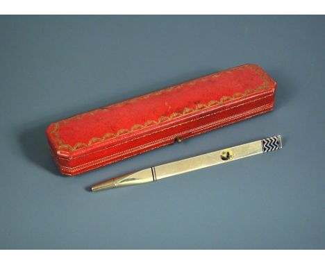 Cartier, an 18ct gold and enamel propelling pencil, the triangular prism body enamelled in blue with geometric motif to top a