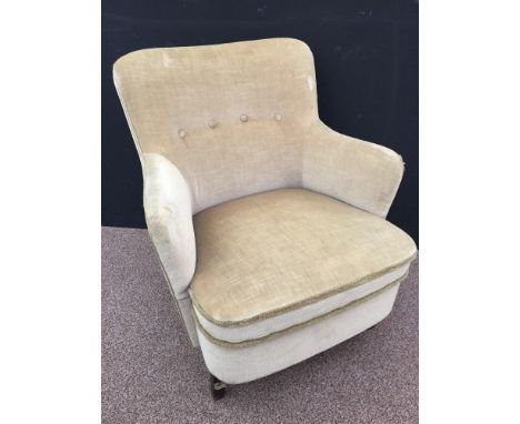 A mid-century Danish button back armchair, raised on tapering square legs 76 x 68cm (30 x 27in)  