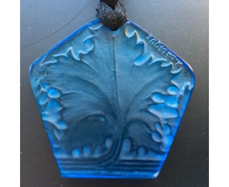 An R. Lalique blue glass pendant, the pentagonal pendant with leaf design, moulded R. Lalique mark 4.50 x 4.50cm (2 x 2in)  C