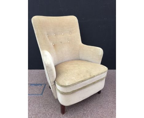 A mid-century Danish button back armchair, raised on tapering square legs 88 x 70cm (34 x 27in)  