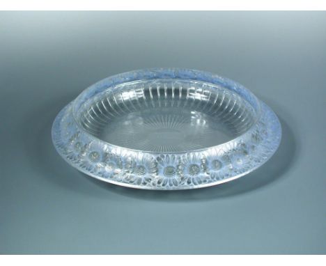 Marguerites, an R. Lalique glass bowl, with blue tinting, stencilled R. Lalique mark 33cm (13in)  