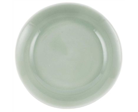 the shallow rounded sides raised on a short foot and rising to a slightly flared rim, the interior and the exterior are cover