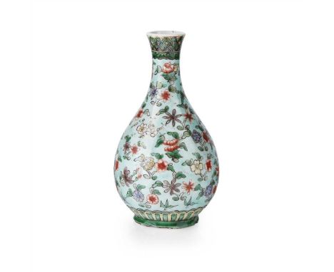           the bulbous body and long neck fully decorated with small flower blossoms on light apple green enamel ground, the f