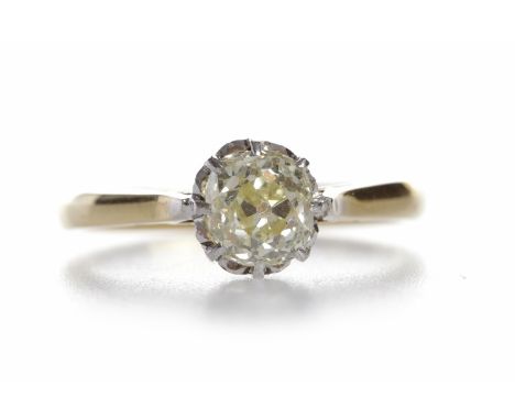 DIAMOND SOLITAIRE RING
the old cushion cut diamond of approximately 0.60 carats, on tapered shoulders, in eighteen carat gold