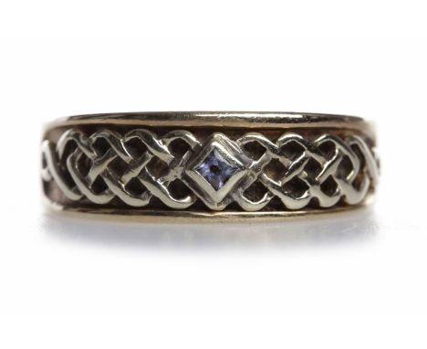 NINE CARAT GOLD GEM SET BAND
the broad band with celtic woven design, set with a single blue princess cut gem, size O, 4.9g