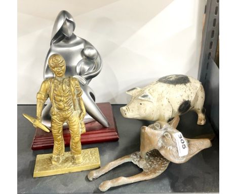 A cast iron pig money box, with a fox door knocker, a brass coalminer and a contemporary figure.