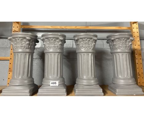 Four useful ceramic columns, H. 30cm.