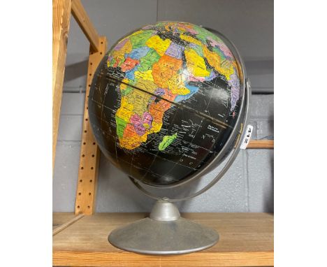 A vintage globe, H. 40cm.