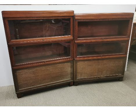 Two oak early 20thC Globe Wernicke three section stacking bookshelves, one section glass missing, largest 115 x 85 x 28cm.