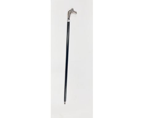 A Michelin advertising style handled walking stick.