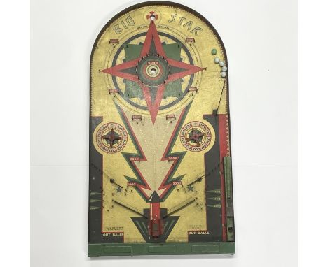 A vintage Big Star bagatelle game with original glass marbles, H. 55cm.