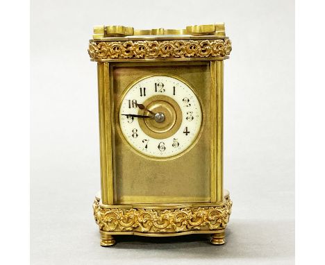 An attractive gilt brass carriage clock, H. 16cm. Appears to be in working order but not tested.