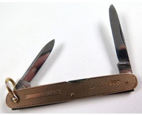9ct gold cased pen knife, with engine turned decoration, hallmarked Sheffield