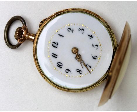 Ladies 14ct Fob watch Black arabic Numerals on a white enamel face weight 18.8 grams