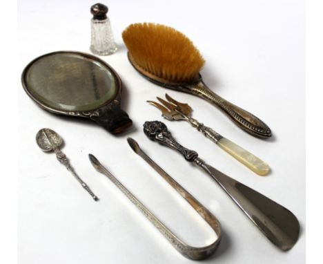 Six hallmarked silver items, comprising sugar tongs, cut glass bottle with silver lid, dressing table brush and mirror (brush