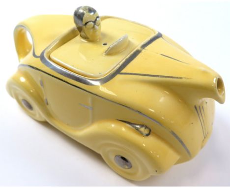 Sadler yellow racing car teapot 'OK T42', chip to underside of lid, length 20cm approx.