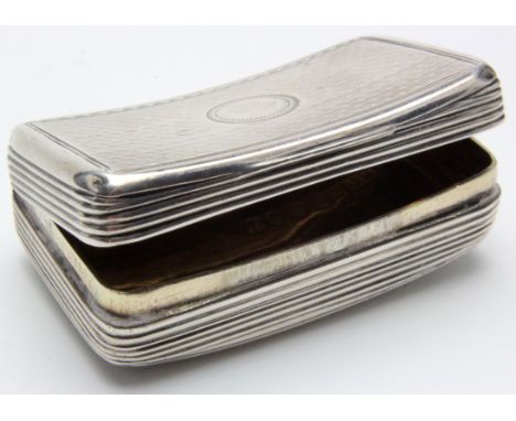 Silver & gilt curved snuff box, hallmarked 'WE, London 1820', not engraved, weight 0.85 ounces approx., 2.7cm x 4.7cm approx.