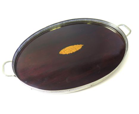 Inlaid mahogany twin handled oval tray with silver plated surround, 42cm x 65.5cm approx.