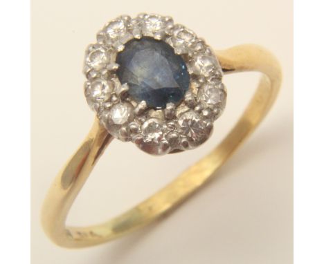 18ct Gold Ring with central Sapphire surrounded by Diamonds size R weight 3.5 grams