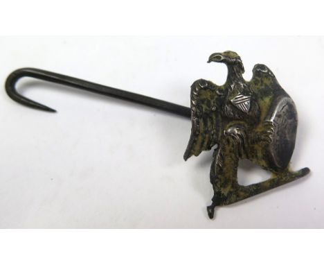 White metal button hook with eagle emblem to end, circa 1800. length 8cm approx., From the estate of the British Marine Offic