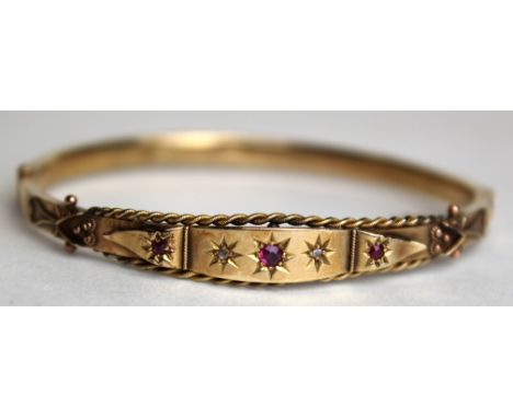 9ct Gold Ruby/Diamond set Bangle weight 7.8 grams (safety chain needs repair)