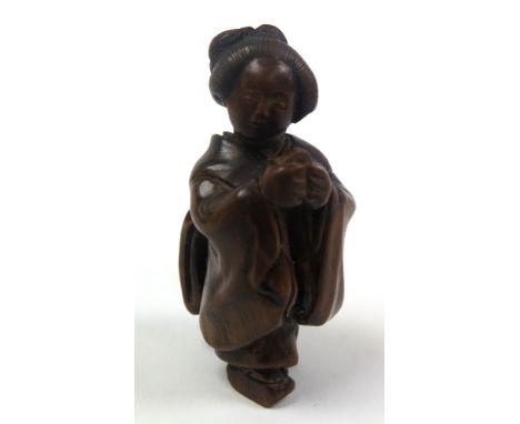 Carved wood Japanese netsuke, depicting a female in traditional dress, height 5.4cm approx.