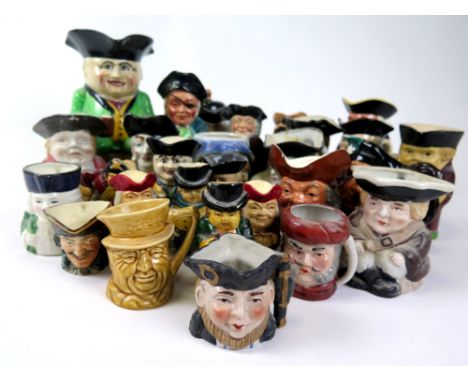Toby & Character Jugs. A collection of approximately twenty-eight ceramic jugs (including a toby jug teapot, by Price Kensing