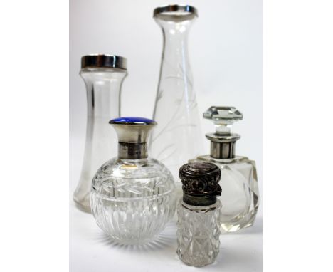 Five silver mounted glass items - 2 vases and 3 perfume bottles - includes a blue enamel -topped perfume bottle - hallmarked 